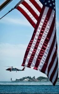 CG helo and flag